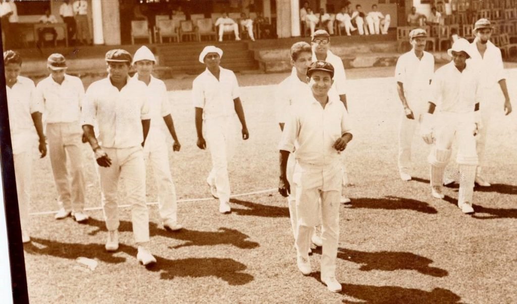Brian Silva leads the side out in a friendly game, circa 1971